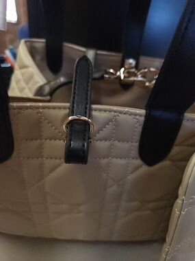 Beige Quilted Tote with Black Handles and Gold Hardware
